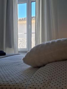 Postel nebo postele na pokoji v ubytování Le charme à la française - Appartement 4 pers