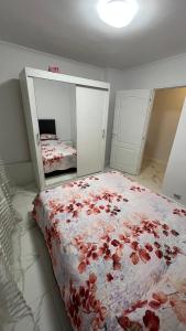 Ένα ή περισσότερα κρεβάτια σε δωμάτιο στο Apartament ilie