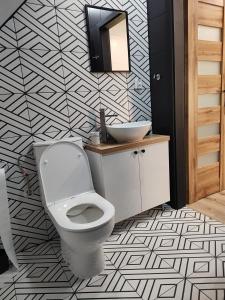 Ένα μπάνιο στο Apartment pod Sysunia