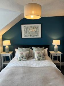 Ένα ή περισσότερα κρεβάτια σε δωμάτιο στο Caledonian House Apartment +14 φωτογραφίες