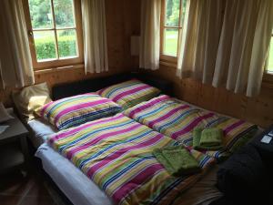 Posteľ alebo postele v izbe v ubytovaní Eisenberg Chalet