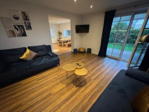 Телевизор и/или развлекательный центр в BOHO Apartment Nuit with garden near Salzburg