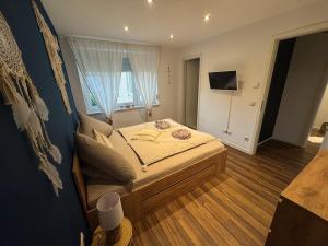 Ένα ή περισσότερα κρεβάτια σε δωμάτιο στο BOHO Apartment Nuit near Salzburg