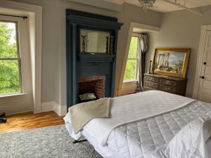 Voodi või voodid majutusasutuse Bonaparte Castle toas