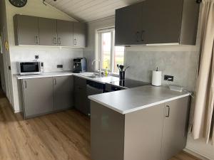 Kuchyň nebo kuchyňský kout v ubytování Árbakki Horsecenter cottage