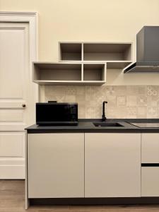 Η κουζίνα ή μικρή κουζίνα στο Casa Sarina Catania