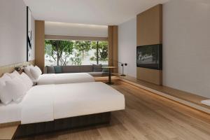 Giường trong phòng chung tại Fairfield by Marriott Yinchuan Xingqing +31 ảnh