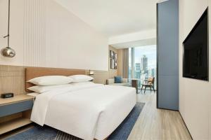 Ένα ή περισσότερα κρεβάτια σε δωμάτιο στο Four Points by Sheraton Shenzhen Bay +34 φωτογραφίες