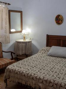 Ένα ή περισσότερα κρεβάτια σε δωμάτιο στο Apartamento Pitres-Casa Rural La Chaparra +6 φωτογραφίες