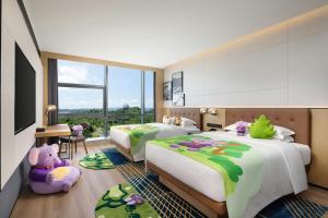 Ένα ή περισσότερα κρεβάτια σε δωμάτιο στο Four Points by Sheraton Wuyuan +38 φωτογραφίες