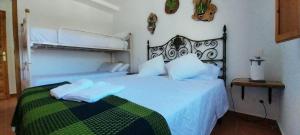 Postel nebo postele na pokoji v ubytování Casa Rural La Higuera