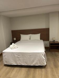 Postel nebo postele na pokoji v ubytování Amazon Seasons hotel