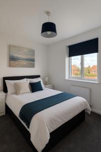 Postel nebo postele na pokoji v ubytování Modern Houghton-le-Spring stay near Durham