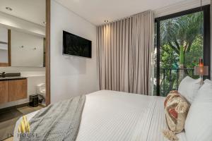 Postel nebo postele na pokoji v ubytování Morph 301 - Fresh Air Retreat in Poblado/AC + 36 fotografií