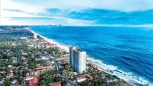 an aerial view of a beach and the ocean at Sandora Living in Wattala