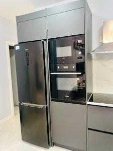 Η κουζίνα ή μικρή κουζίνα στο Céntrico apartamento de 2 habitaciones +29 φωτογραφίες