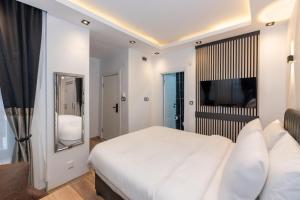 Postel nebo postele na pokoji v ubytování Boutique 360 Suite