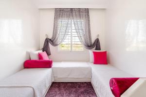 Ένα ή περισσότερα κρεβάτια σε δωμάτιο στο Comfort Pool Apartment Heart of Tamaris