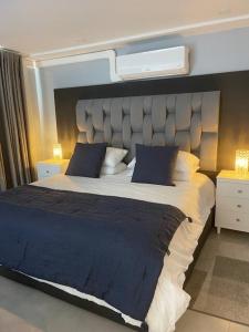 Ένα ή περισσότερα κρεβάτια σε δωμάτιο στο Elegant Studio -Near Parque Poblado & Provenza