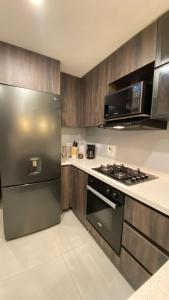 Η κουζίνα ή μικρή κουζίνα στο Elegant Studio -Near Parque Poblado & Provenza