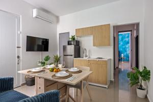 a kitchen with a table and a dining room at Portocafe Ocean Park Home 5Bd 4b Pool WalkToBeach in San Juan