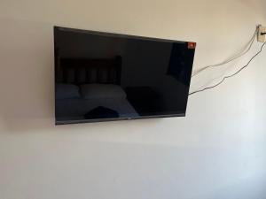 TV a/nebo společenská místnost v ubytování Excelente Flat,aconchegante e Sossegado