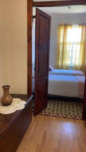 Postel nebo postele na pokoji v ubytování Casa Antonio Taño + 6 fotografií