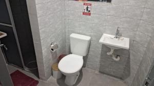 Koupelna v ubytování Quarto central em ótima localização