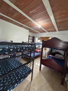 Postel nebo postele na pokoji v ubytování La Posada De Joseph - El palmar de Dagua + 11 fotografií
