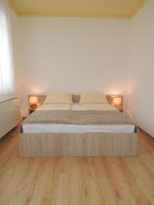 Letto o letti in una camera di Hotel Logavina 8 Garage Parking