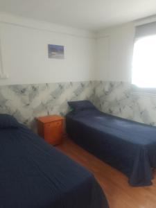 Postel nebo postele na pokoji v ubytování Pieza para 2