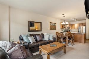 a living room with a couch and a table at Small Town Feel Big Mountain Access in Frisco