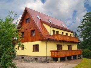 a large house with a brown roof at Willa pod Szrenicą in Szklarska Poręba