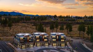 an aerial view of a building at sunset at 1115 Aerie Buyout 2 Units Near Downtown Hot Tub Mountain View in Bend
