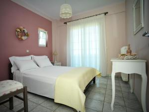 A bed or beds in a room at Locanda