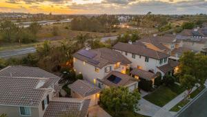 an overhead view of a group of houses at Spacious 4BR Home w Fireplace Work Space Backyard Dining in San Diego