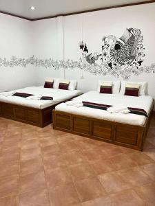 Ένα ή περισσότερα κρεβάτια σε δωμάτιο στο Old City Guest House