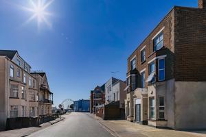 an empty street in a city with buildings at Triple B Aparto in Clacton-on-Sea