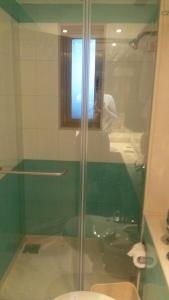 Koupelna v ubytování The Royal Orchid Hotel, Chembur