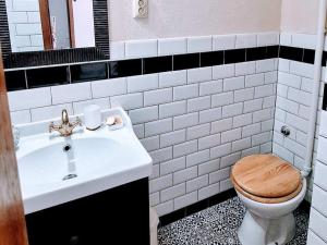 Ένα μπάνιο στο La Casa Nostra Apartments - Comfort 1 Bedroom Apt