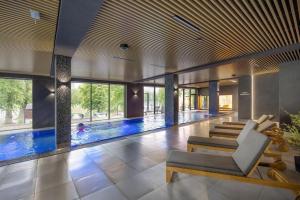 Πισίνα στο ή κοντά στο Holiday studio with balcony, indoor pool, sauna