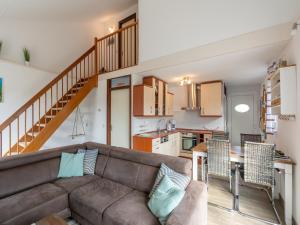 Kuchyň nebo kuchyňský kout v ubytování Lovely holiday home in Julianadorp