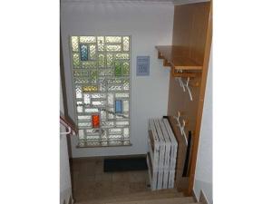 a stairway with a window in a room at Holiday home with 3 bedrooms in Treis-Karden