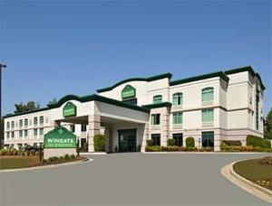 a rendering of the front of a hotel at Wingate by Wyndham Macon in Macon