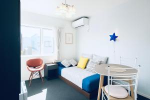 Ένα ή περισσότερα κρεβάτια σε δωμάτιο στο 夢富良野