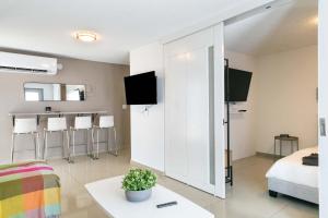 TV/trung tâm giải trí tại Aquaville Dorado Moderna Villa 1