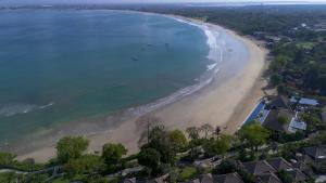 an aerial view of a beach with houses at ASAI Village in Jimbaran