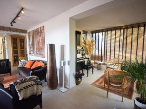 a living room with couches and chairs at Carqueiranne: Villa de Charme avec Piscine, Vue Mer, pour 8 Personnes - FR-1-599-119 in Carqueiranne +15 photos