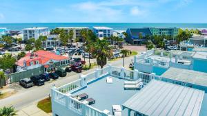 an aerial view of a city with buildings and the ocean at 1 Block to Beach Newly Renovated 6BDR w Rooftop Views Sand Dune by AvantStay in Mount Pleasant