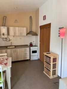 Kuchyň nebo kuchyňský kout v ubytování Agosto 23 Centrico + 10 fotografií